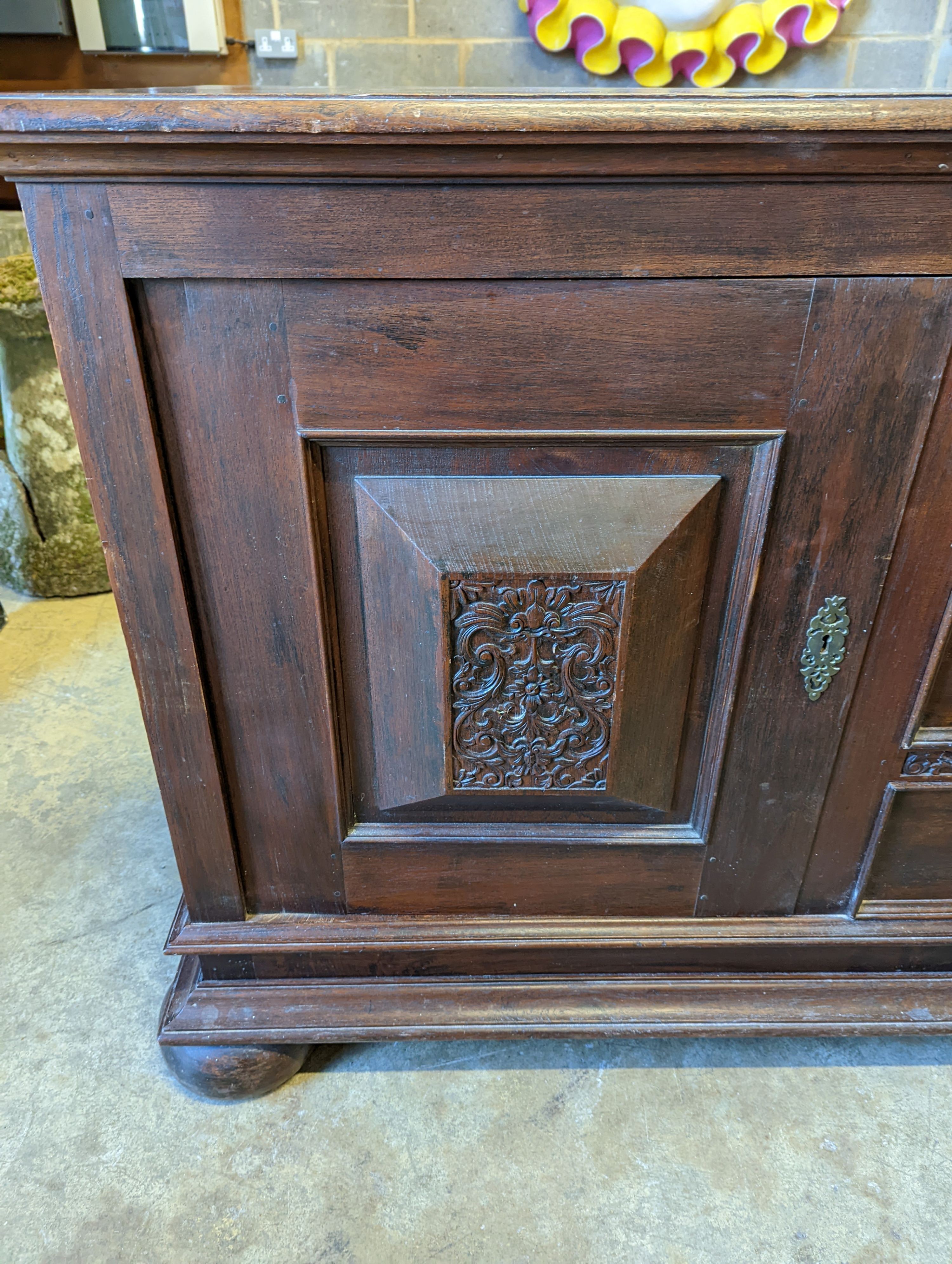 A 19th century Dutch oak buffet, width 210cm, depth 70cm, height 102cm